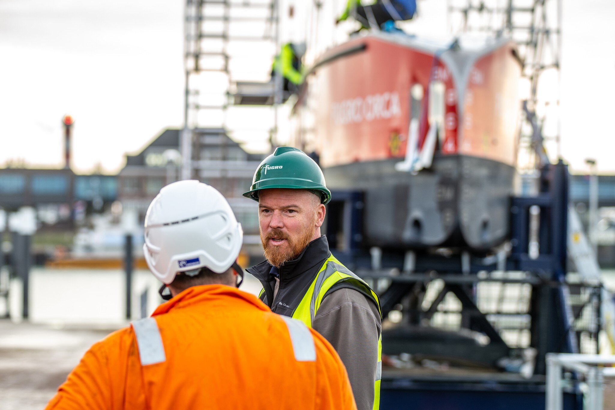 The Fugro Orca, Blue Essence USV being prepared for use in Berghaven, Netherlands for its first commercial job
Apparel,  Clothing,  Helmet,  Human,  Person