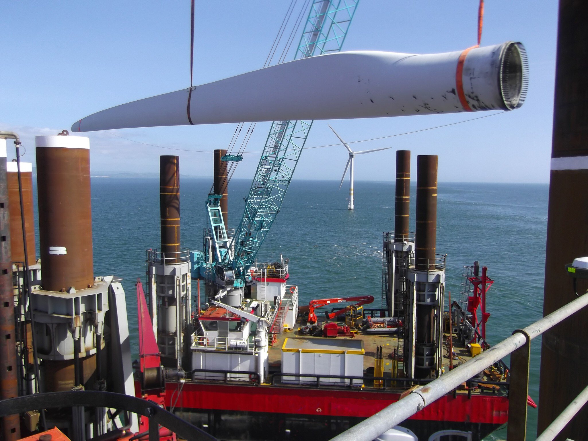 Offshore wind farm repair and maintenance work on board of the Fugro jack-up barges Deep Diver 1 and Excalibur, Arklow Bank, Southern Ireland.
2 oclock blade back on (1)
2 oclock blade back on (1)
Photograph - Fugro owned,  seacore,  turbine,  platform,  Excalibur,  jack-up,  Offshore wind farm repair and maintenance,  Photograph - Fugro owned,  offshore wind farm,  renewable energy,  Transportation,  Vehicle,  Vessel,  Watercraft
Offshore wind farm repair and maintenance work on board of the Fugro jack-up barges Deep Diver 1 and Excalibur, Arklow Bank, Southern Ireland..2 oclock blade back on (1).2 oclock blade back on (1).Photograph - Fugro owned,  seacore,  turbine,  platform,  Excalibur,  Offshore wind farm repair and maintenance,  jack-up,  offshore wind farm,  renewable energy.Offshore wind farm repair and maintenance work on board of the Fugro jack-up barges Deep Diver 1 and Excalibur, Arklow Bank, Southern Ireland..2 oclock blade back on (1)