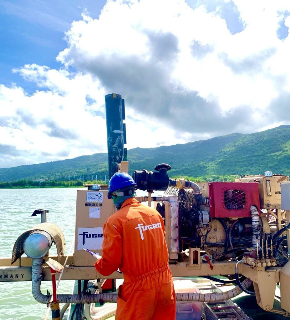 The person in the photo is conducting a rig inspection before the activity starts. PH - Laguna Lake, background is the Mount Tagapo