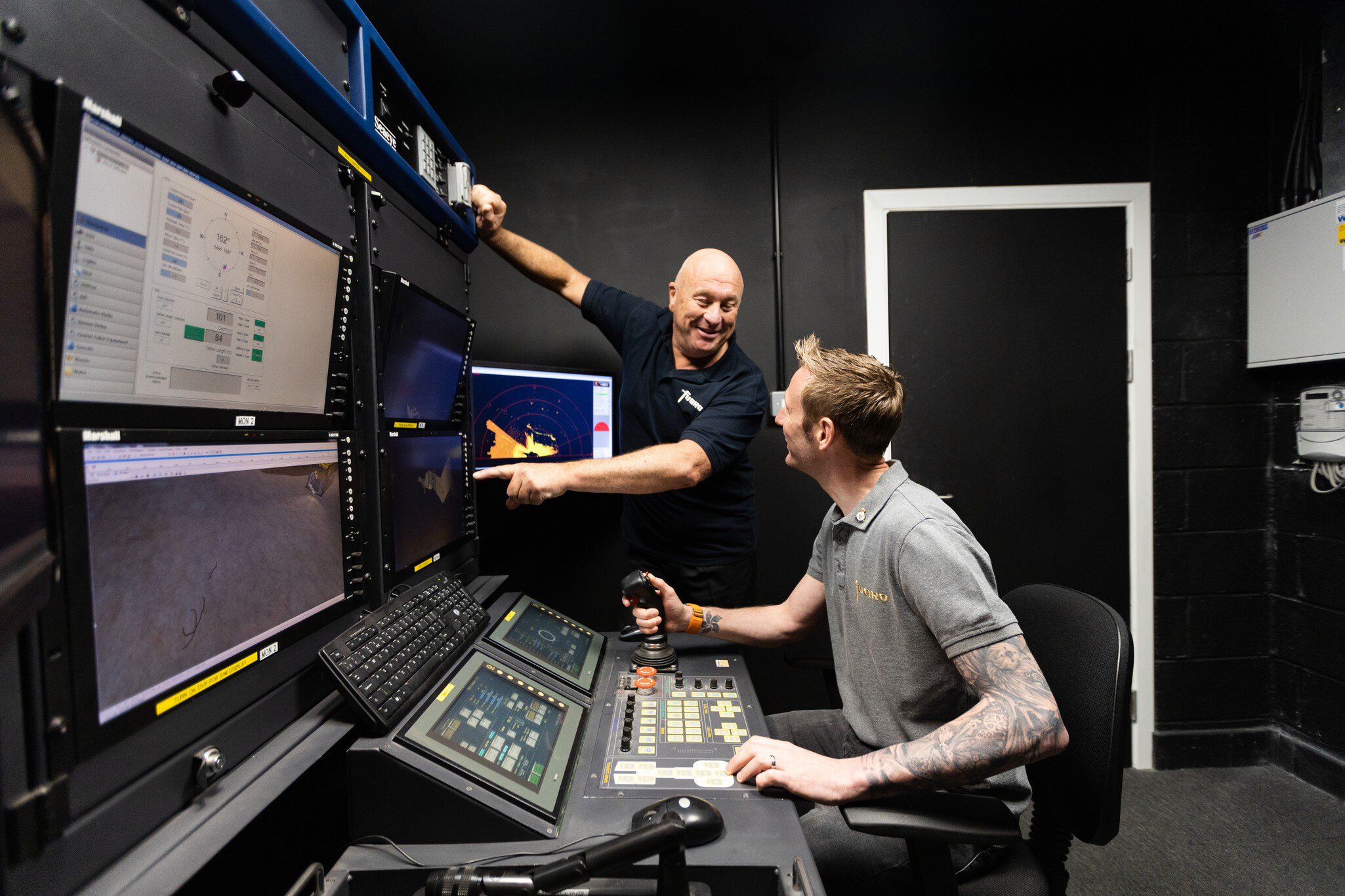 Paul Ensell and Stuart O'Brien on remote operations simulator desk