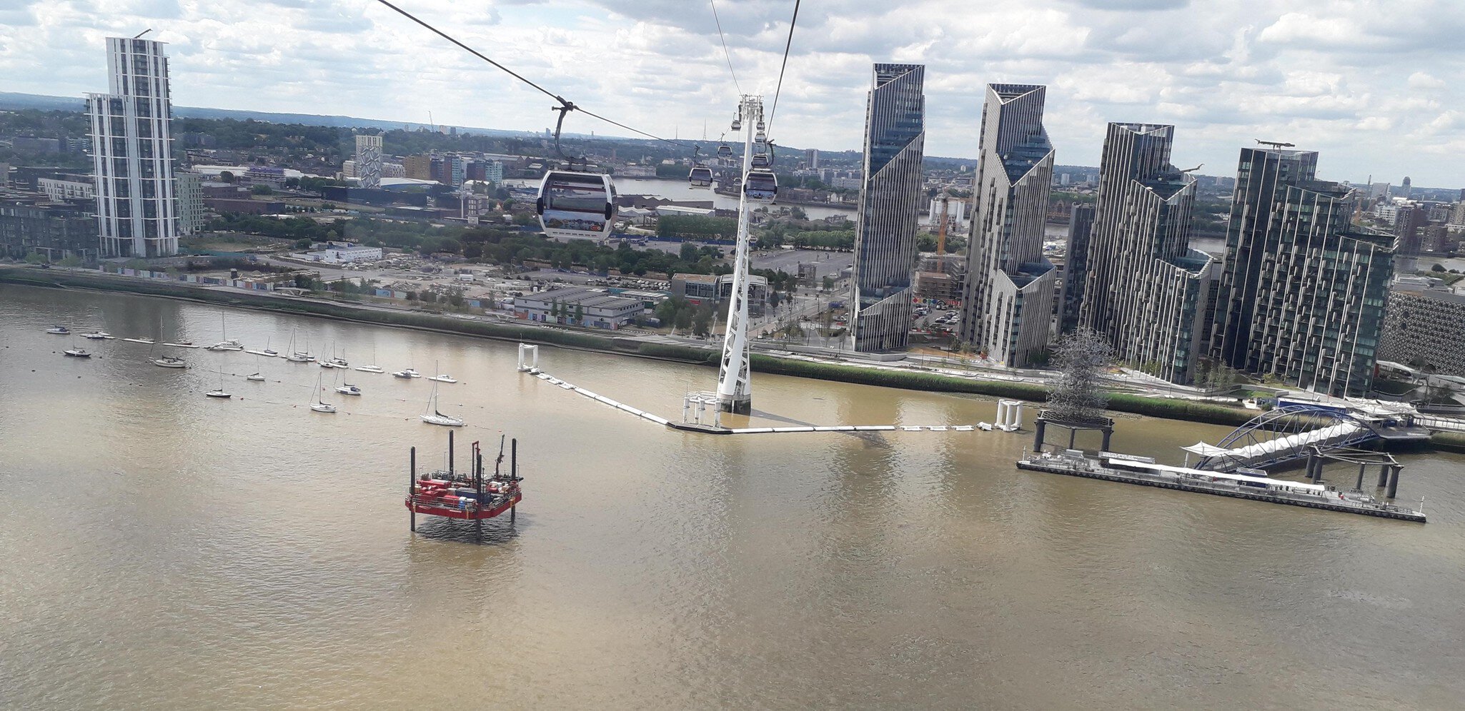 Fugro's Aran 120 mobilised to its first borehole position as part of the Silvertown Tunnels Project. Photo taken on the Emirates Airline cable car.