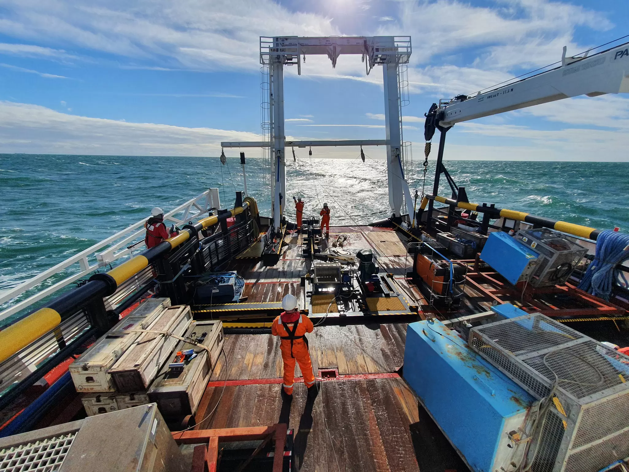 Recovering geophysical equipment from back deck of vessel.jpg