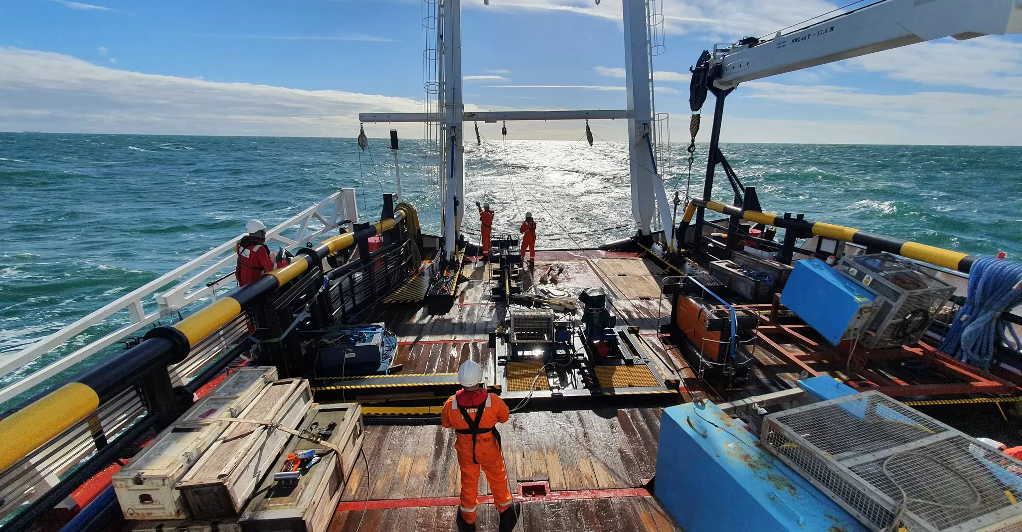Recovering geophysical equipment from back deck of vessel.jpg