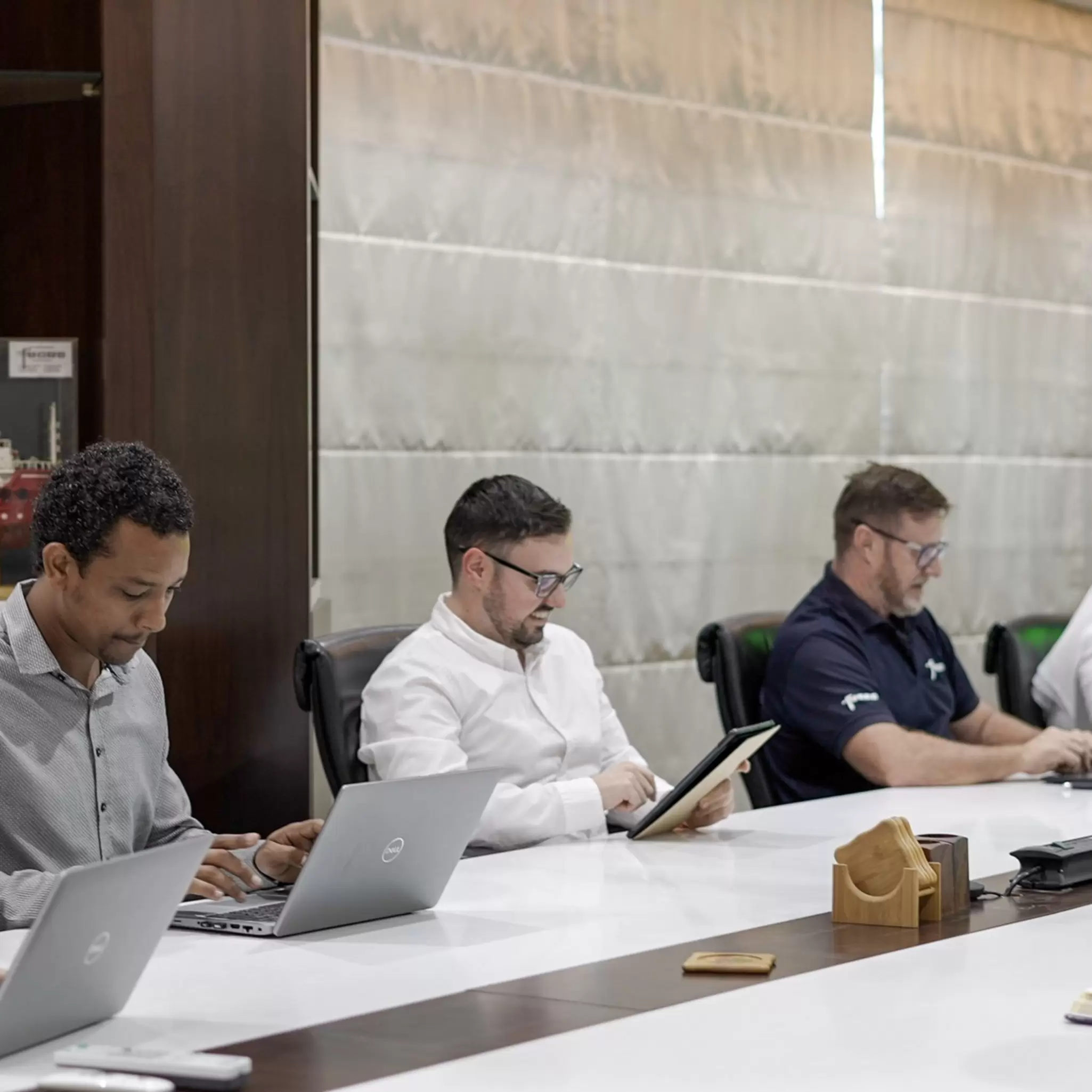 Employees having meeting in Abu Dhabi office 01.jpg