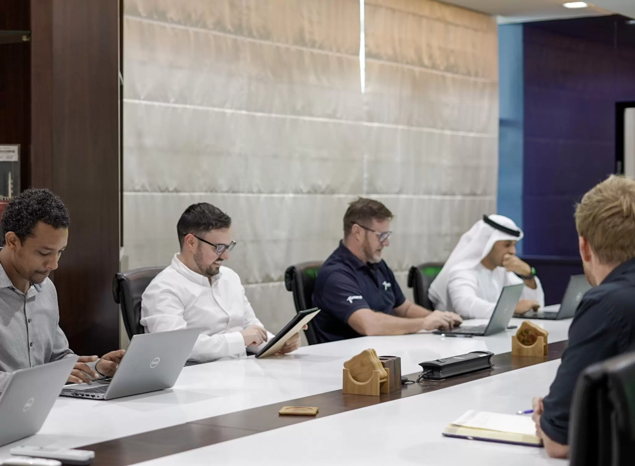 Employees having meeting in Abu Dhabi office 01.jpg