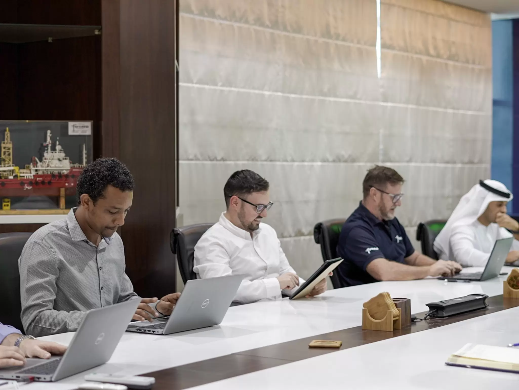 Employees having meeting in Abu Dhabi office 01.jpg