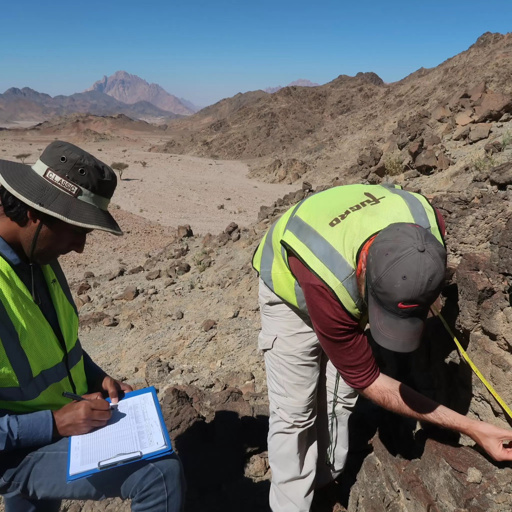 Employees undertaking scanline survey.jpg