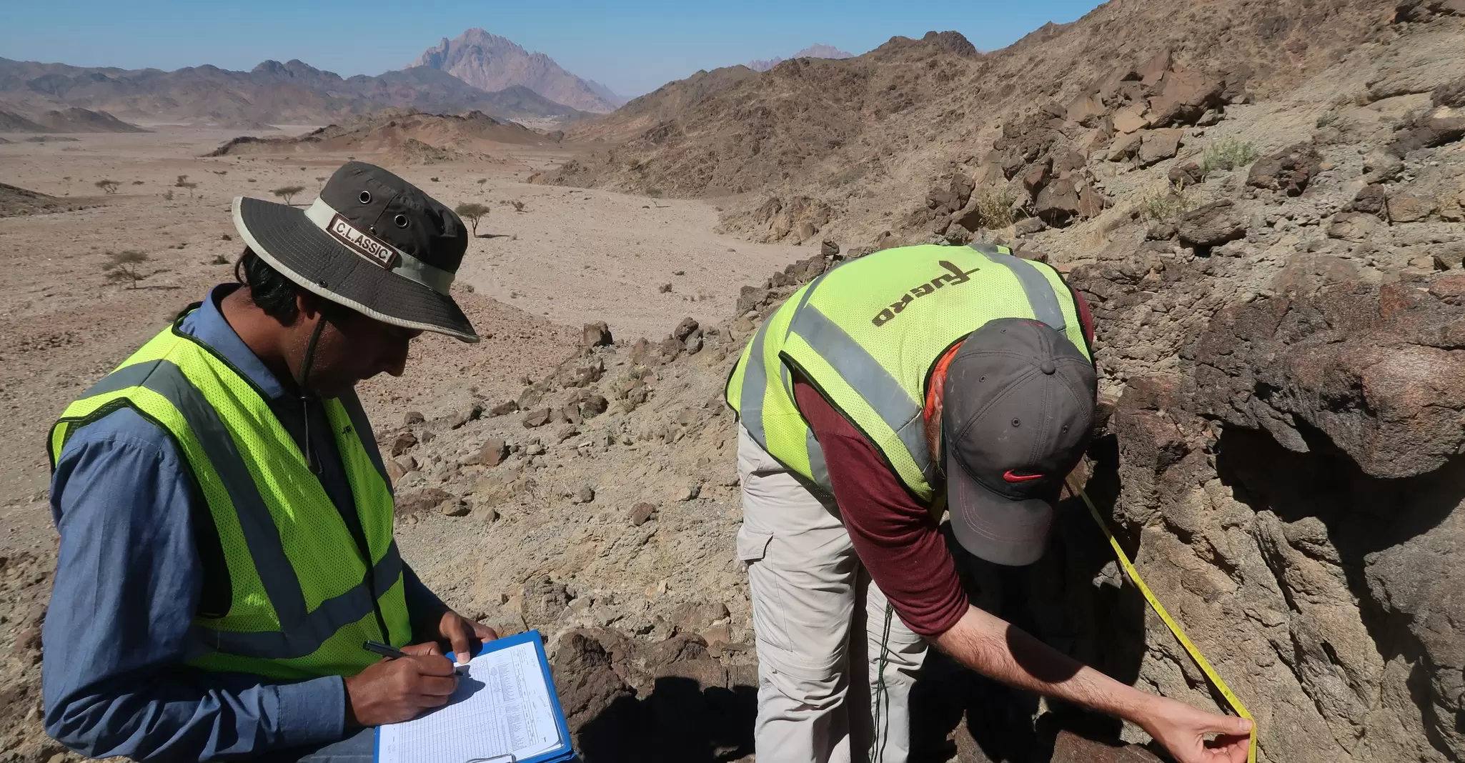 Employees undertaking scanline survey.jpg