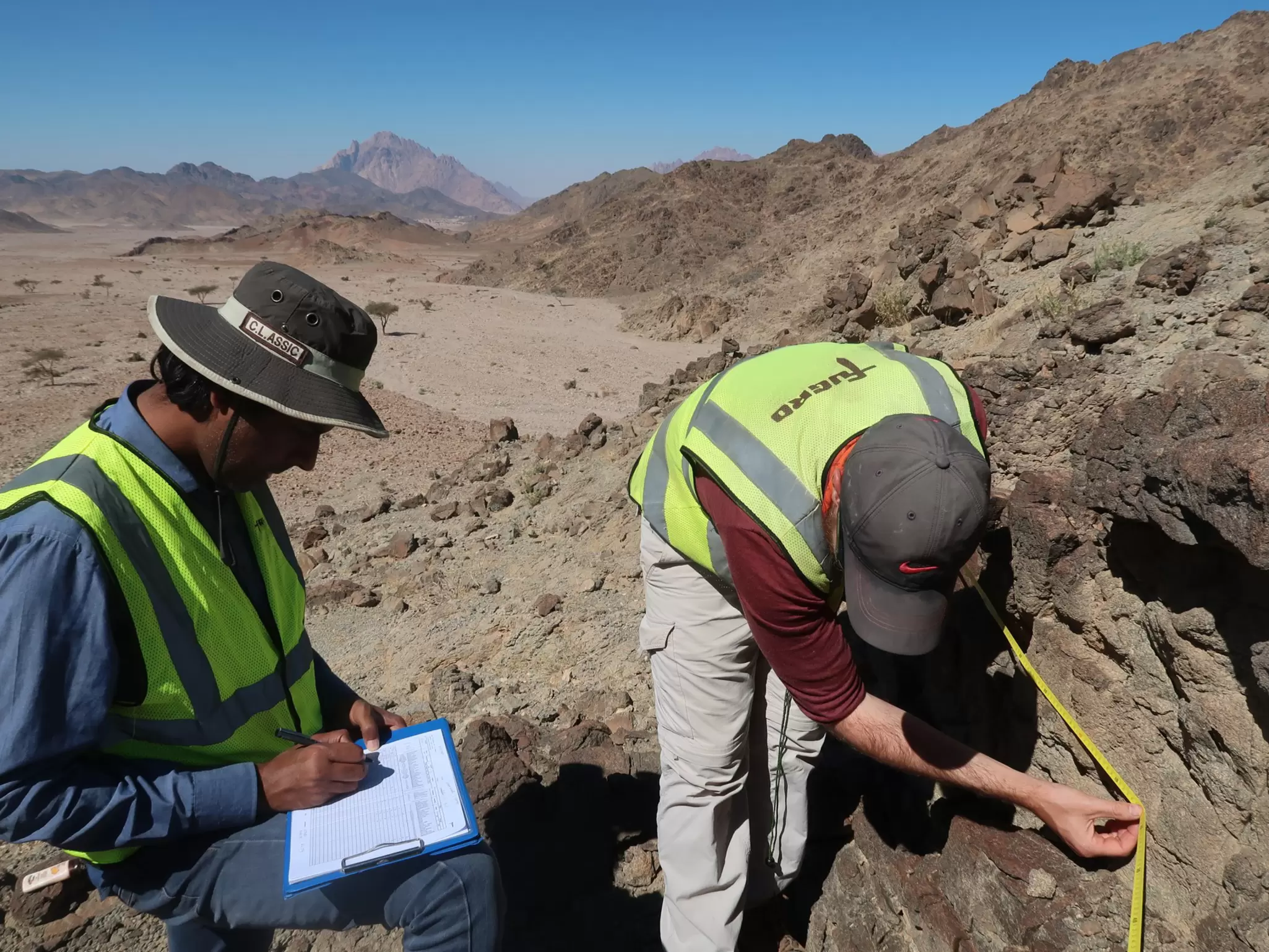 Employees undertaking scanline survey.jpg