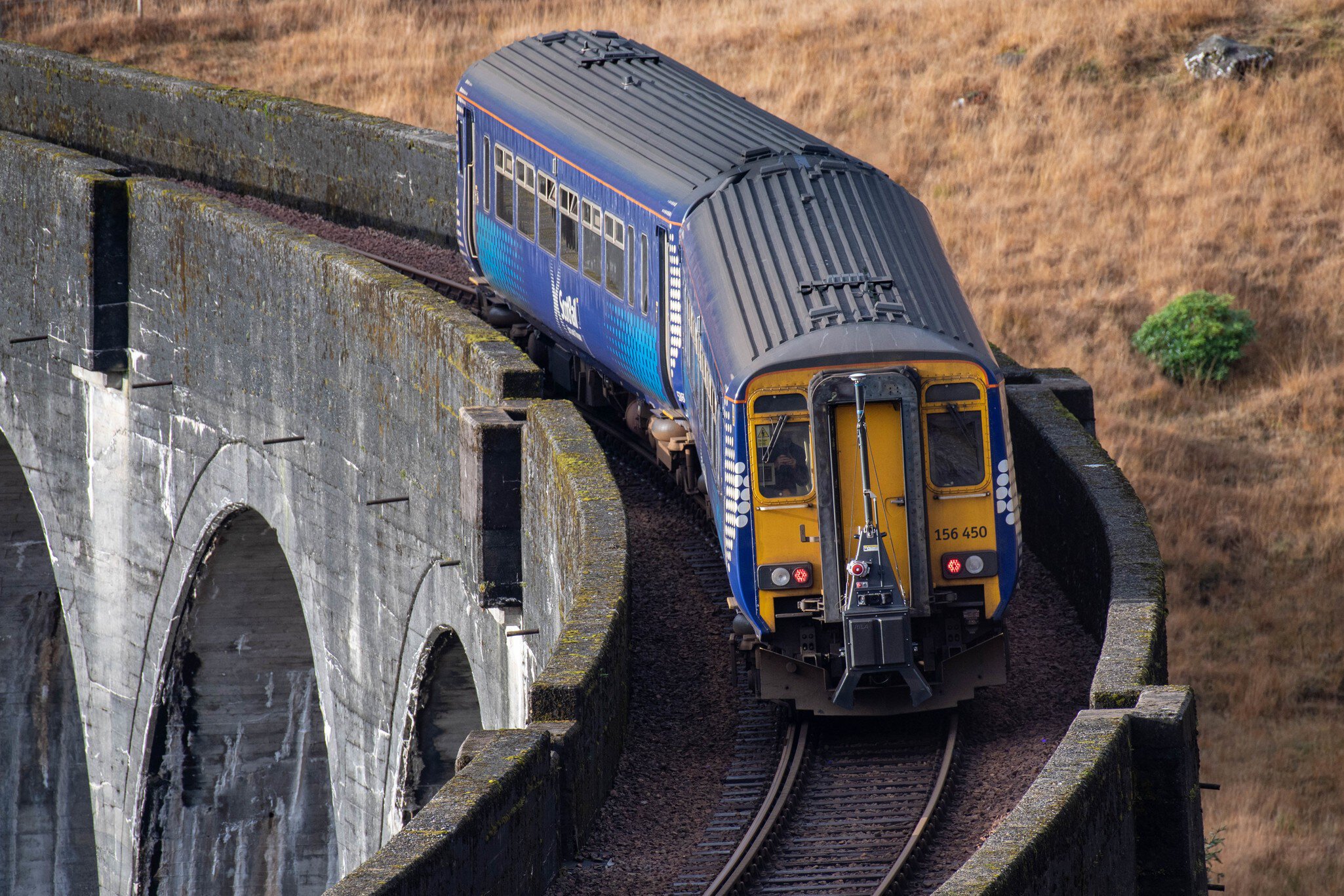 Train with RILA� system crossed the Glenfinnan viaduct, Scotland. Fugro unique RILA� track monitoring system is mounted on a passenger train to simultaneously acquire lidar point cloud and video data of the track and surrounding environment as part of the Network Rail Scotland Gauging Contract.