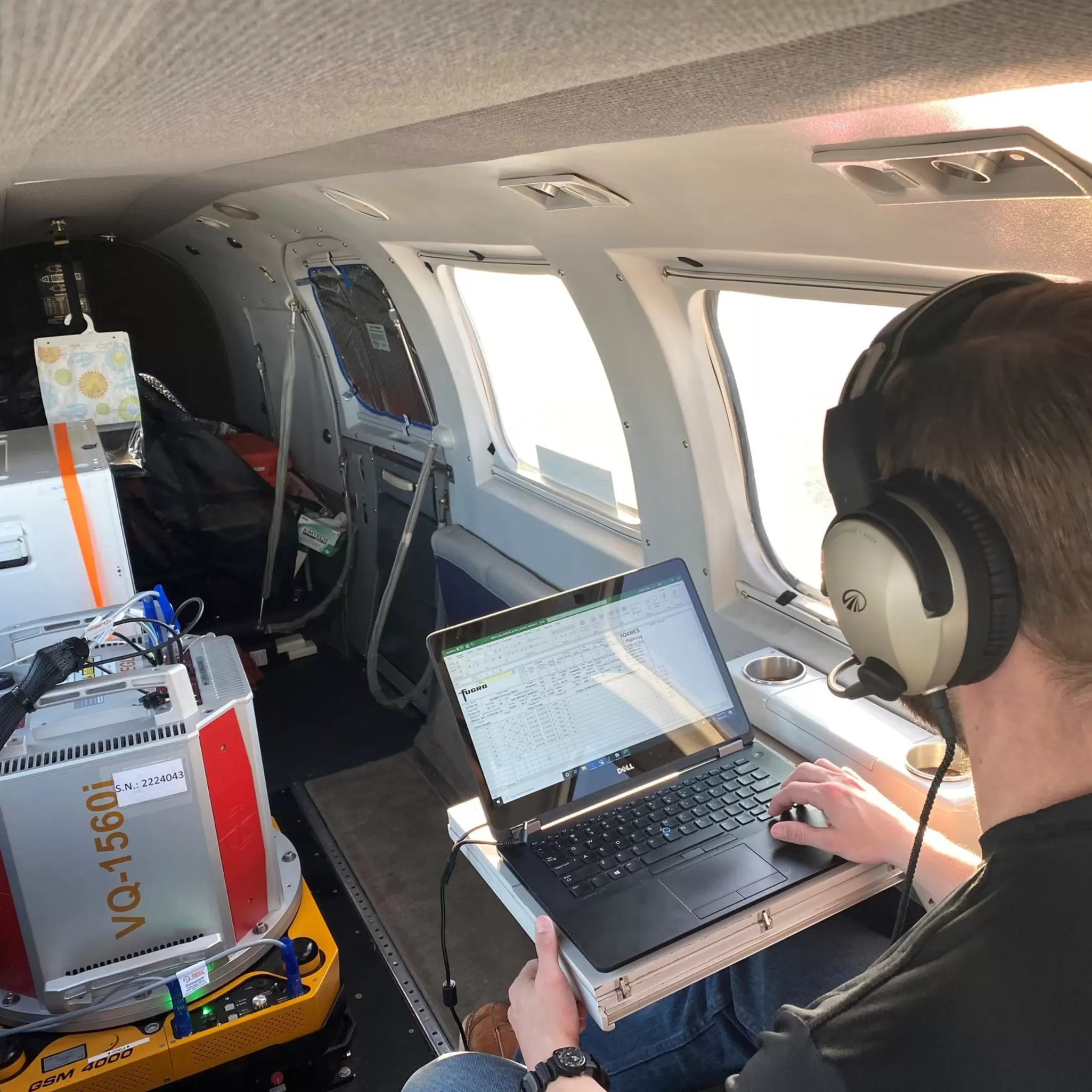 Imagery sensor operator in aeroplane.jpg