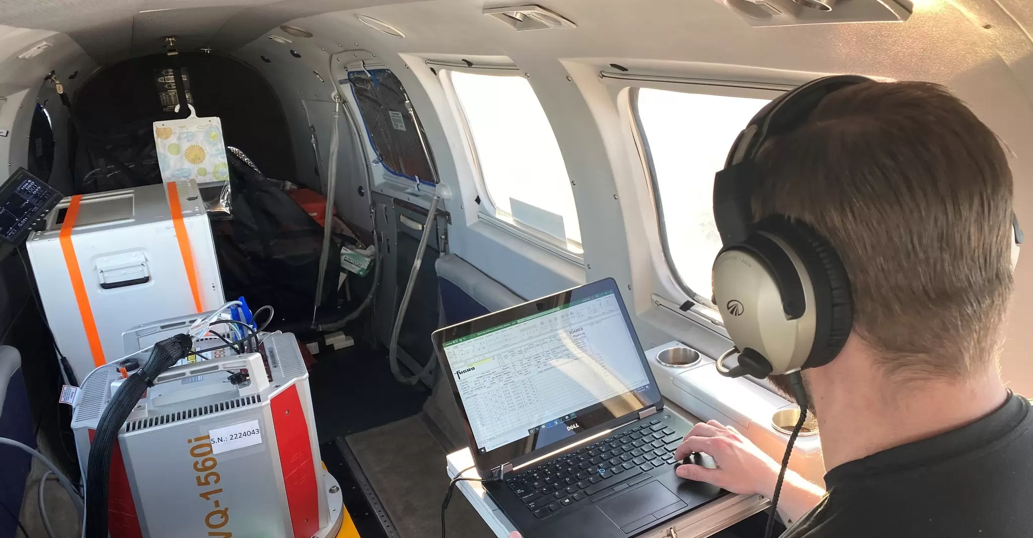 Imagery sensor operator in aeroplane.jpg
